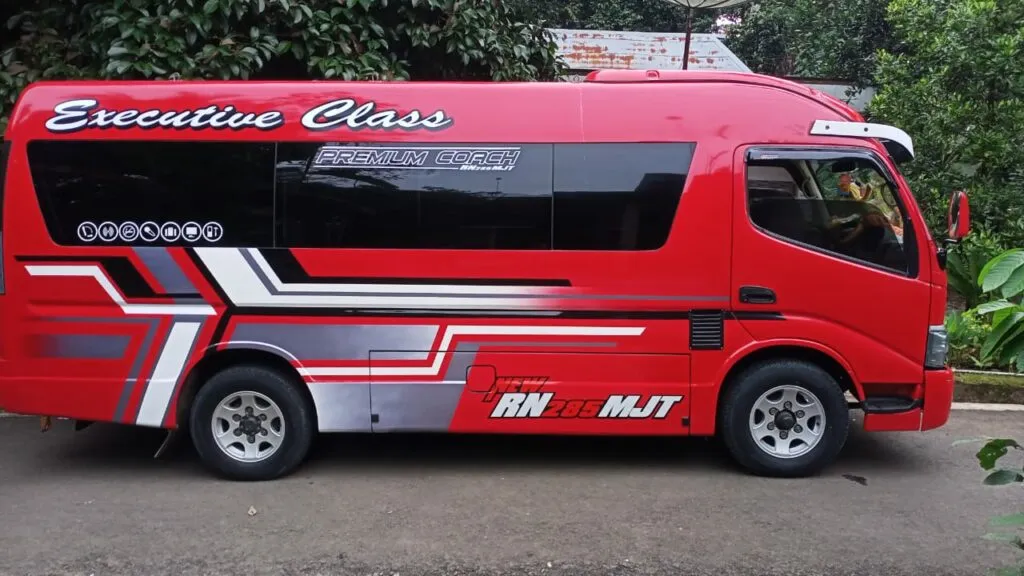 modifikasi mobil elf travel
