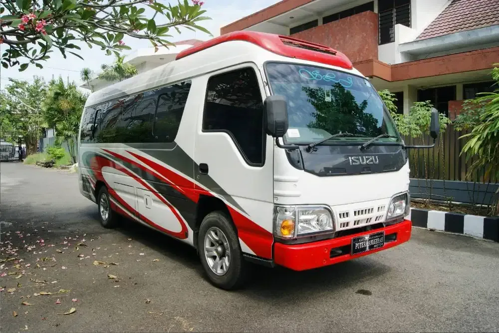 modifikasi mobil elf travel